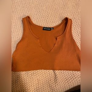 Orange crop top from pretty little thing